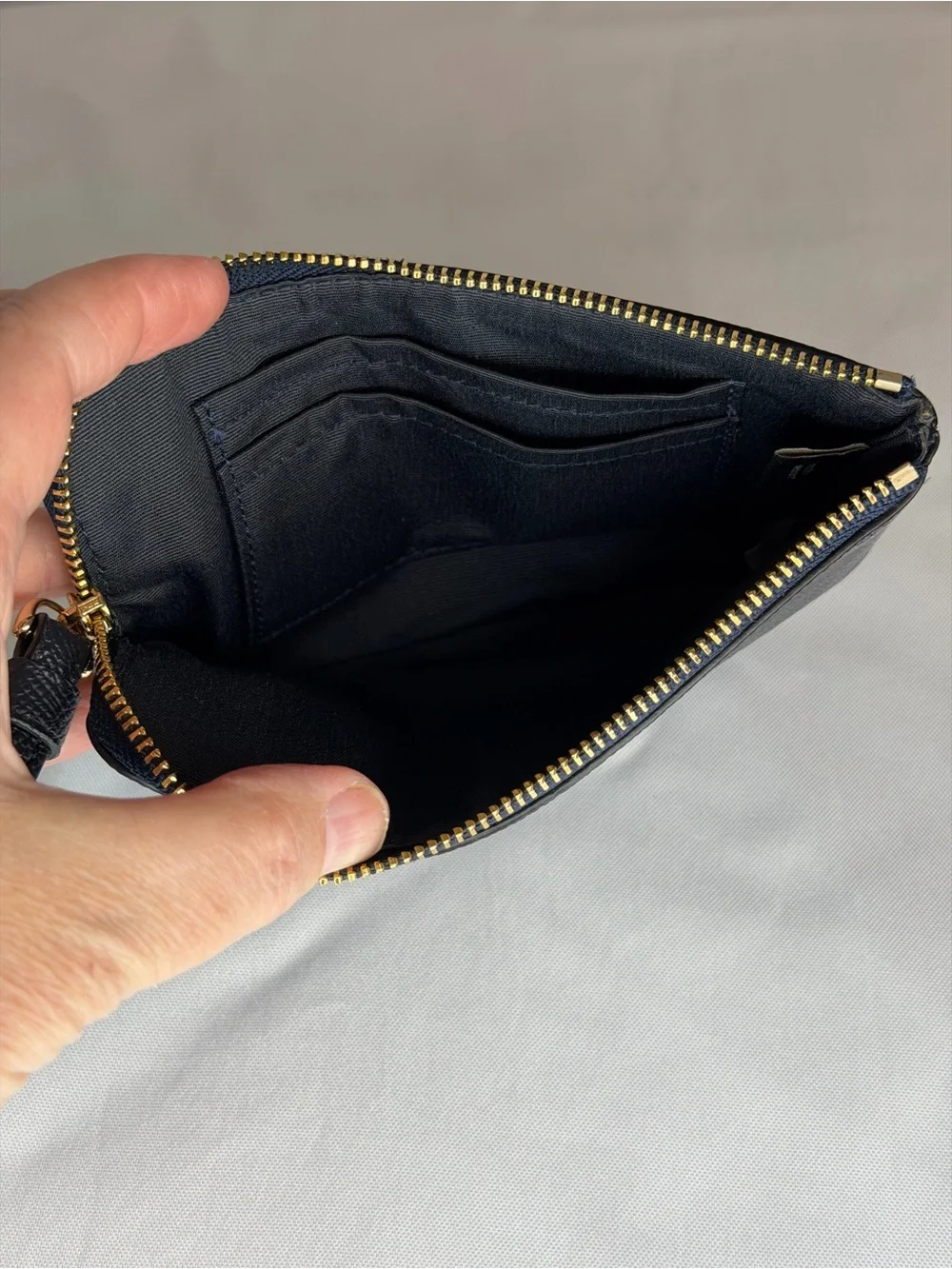 Coach Navy Leather Wristlet with Gold Logo Accent